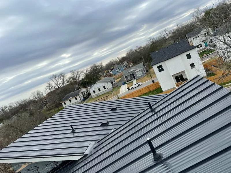 Standing seam metal roof panels with vents for Skylight Repair in Madison Heights